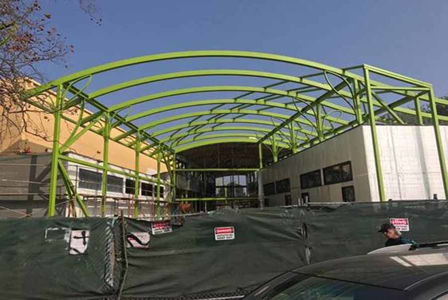 Curved Steel Roof Structure at Rainbow Recreational Center in Oakland, CA.